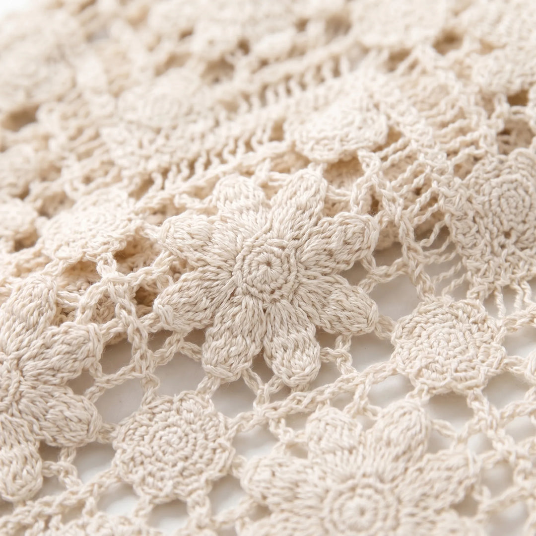 Lightweight open-knit boho tank top for women, a comfortable beige sleeveless vest, perfect for warm weather fashion.