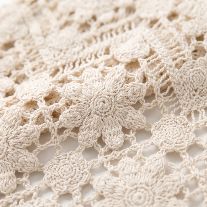 Lightweight open-knit boho tank top for women, a comfortable beige sleeveless vest, perfect for warm weather fashion.