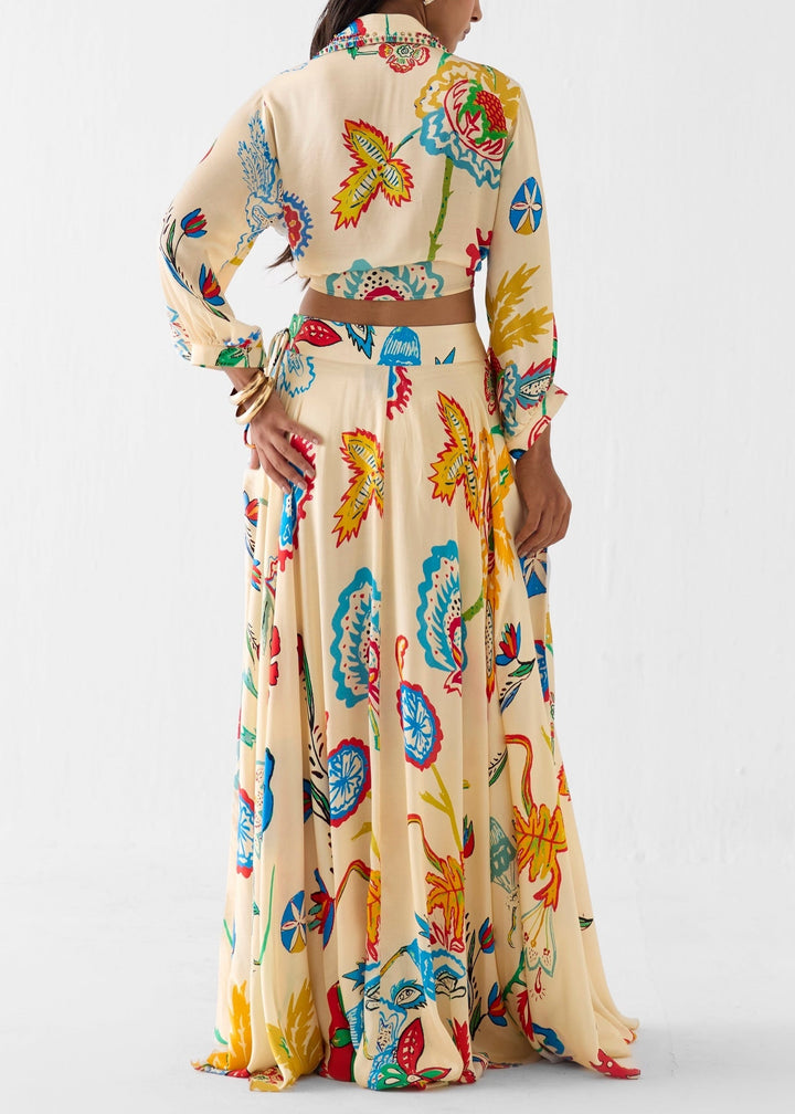 Boho chic beige floral tie front shirt and flowing maxi skirt set, ideal summer vacation outfit.