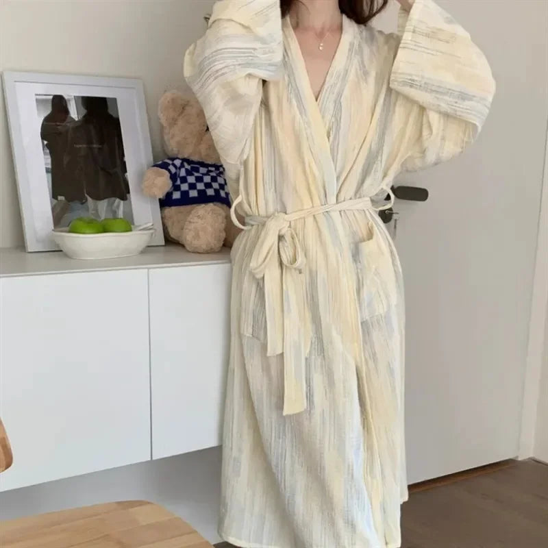 Beige women's lightweight summer kimono robe, a stylish and casual bathrobe for home relaxation.