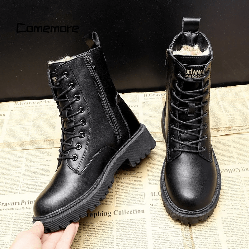 Elegant women's Bella black leather winter boots with cozy lining. Durable non-slip design for comfort and style in winter.