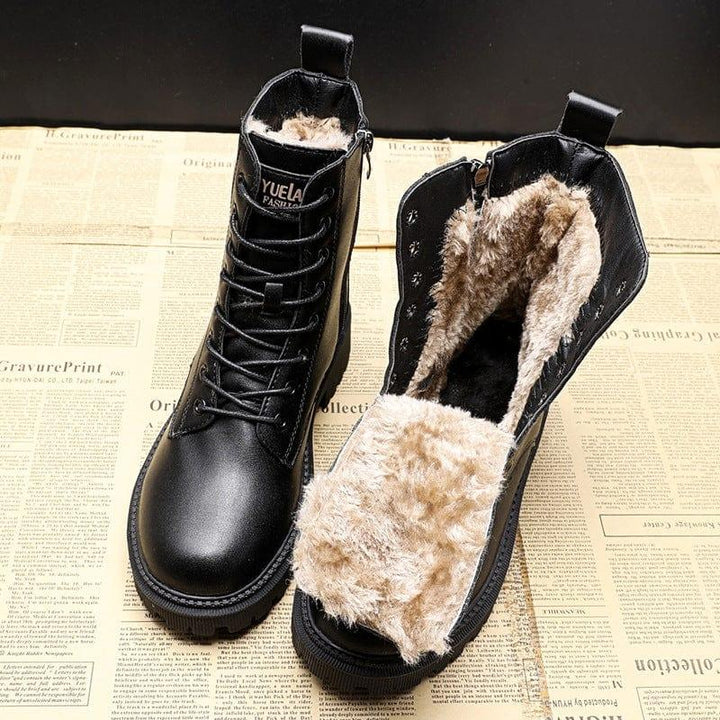 Cozy Bella black leather women's winter boots. Non-slip sole for icy conditions. Warm, stylish, and durable winter footwear.