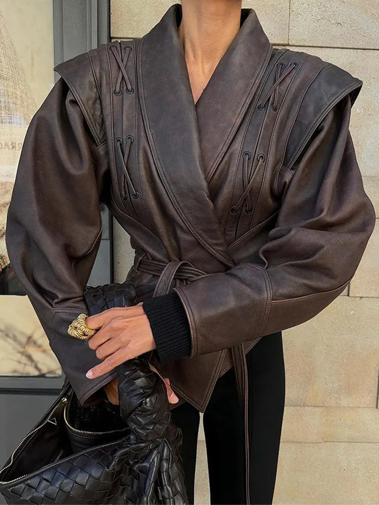 Women's belted jacket, timeless style, and flattering fit for elegant fall and spring fashion.