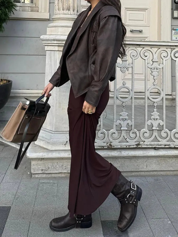 Versatile women's belted jacket, offering a flattering fit for everyday and polished outfits.