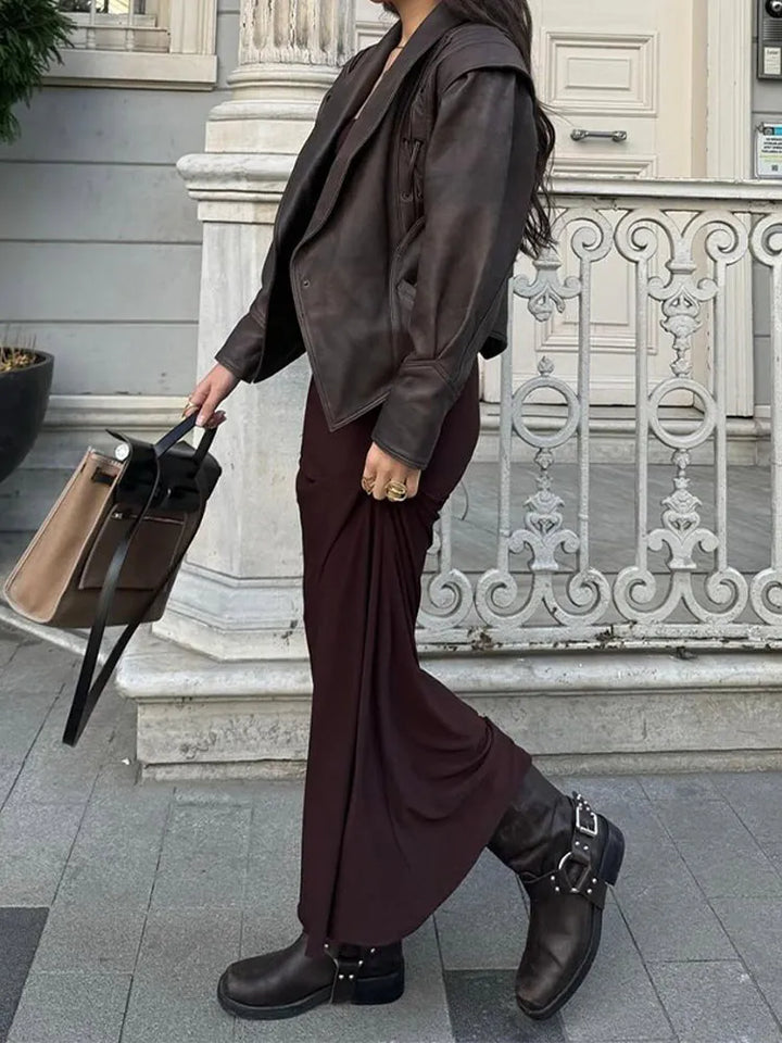 Versatile women's belted jacket, offering a flattering fit for everyday and polished outfits.
