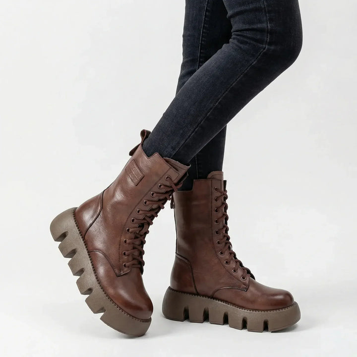 Comfortable women's arch support combat boots. Platform lace-up design with non-slip sole for everyday wear.
