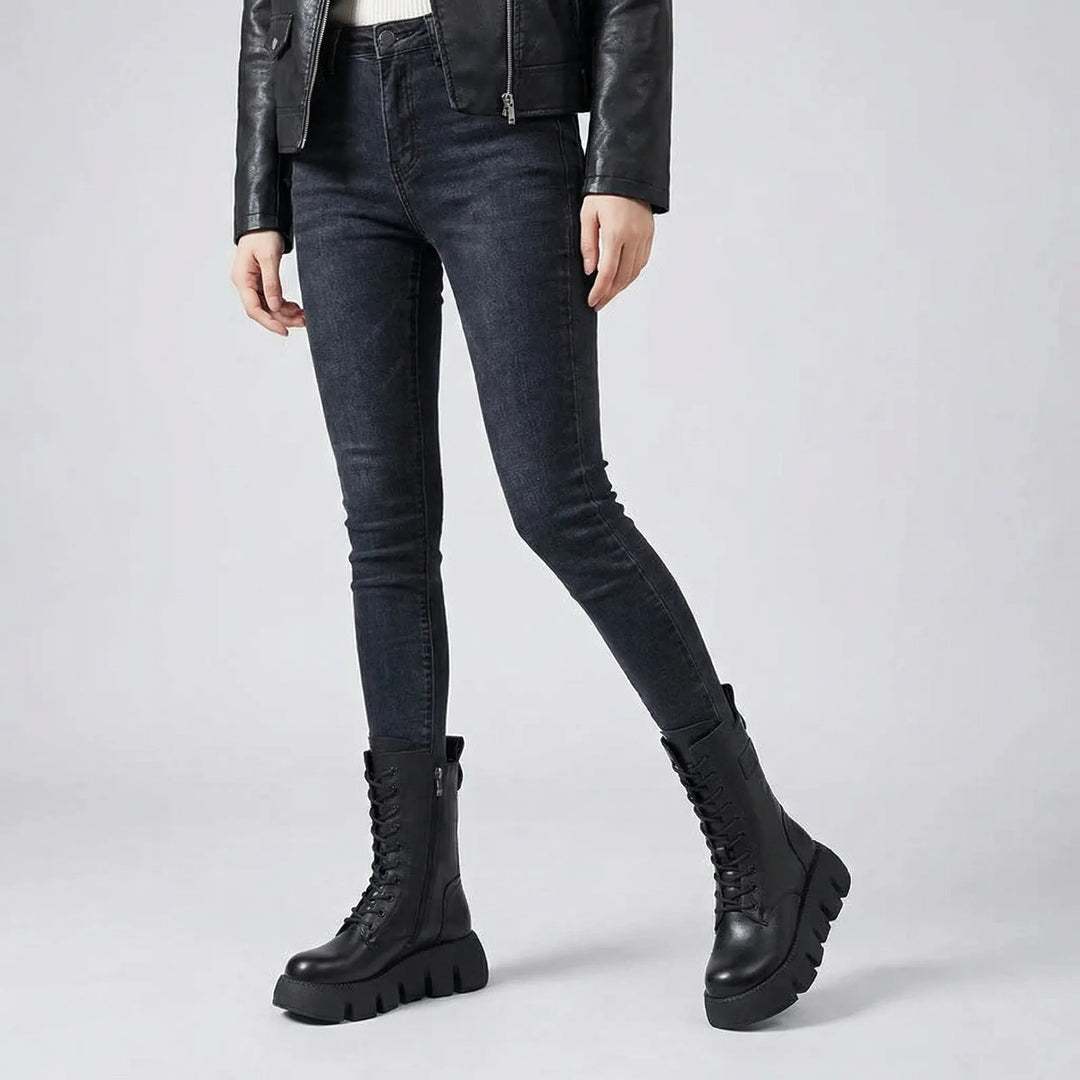 Durable women's platform combat boots featuring lace-up closure and arch support for all-day comfort.