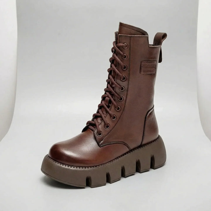Modern women's platform combat boots. Lace-up, arch support, non-slip sole. Ideal for fall & winter.