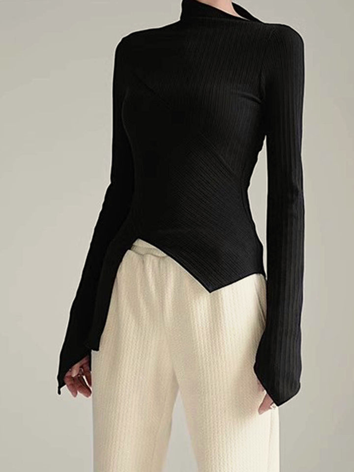 Women's asymmetrical black cutout long sleeve jumper, soft cotton blend, contemporary fashion.