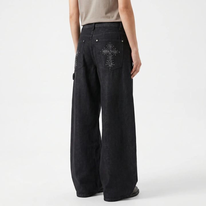 Low-rise women's baggy wide-leg jeans with a unique studded cross, ideal for punk and alternative fashion.