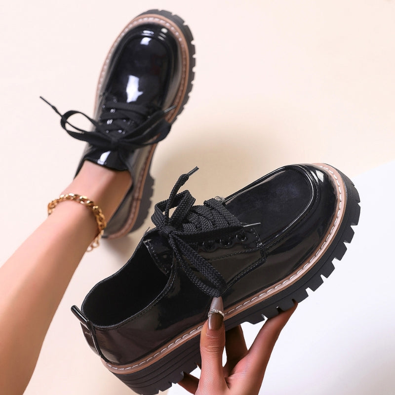 Chic women's cream chunky platform loafers, ideal statement shoes for both professional and casual looks.