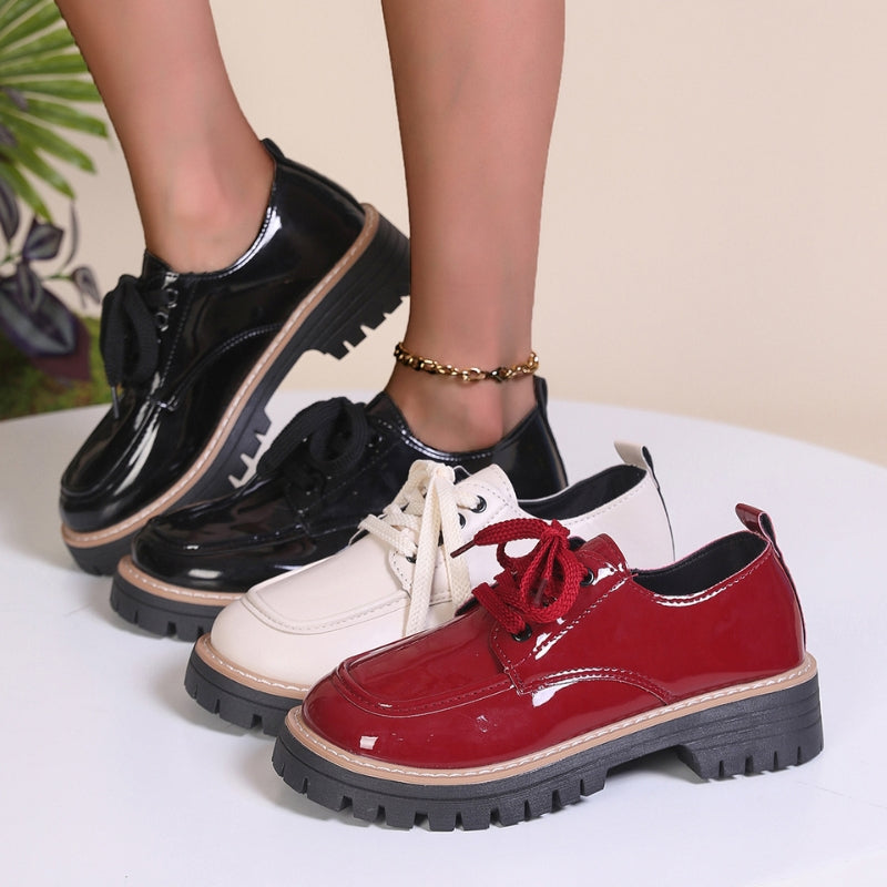 Stylish women's red chunky platform loafers, featuring a comfortable platform for ultimate fashion and support.