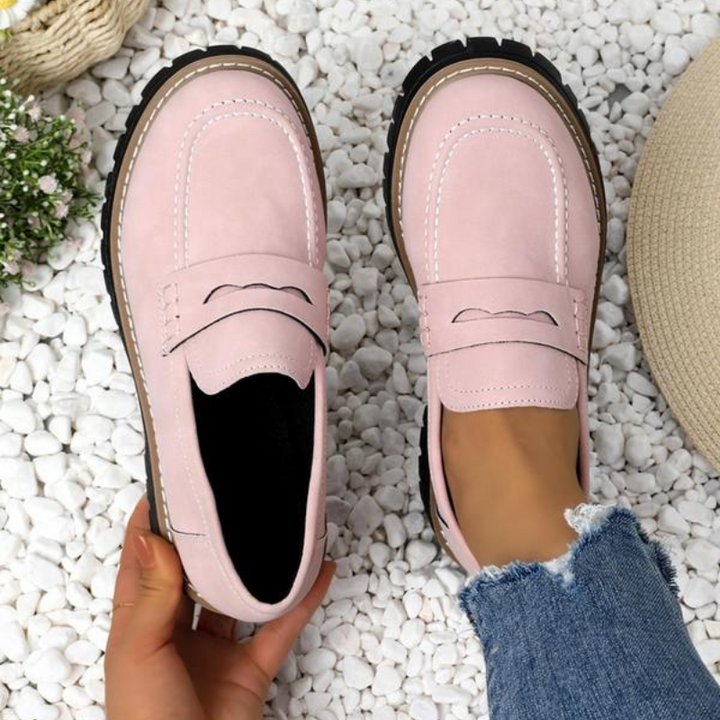 Stylish women's chunky platform loafers, perfect for adding a modern touch to any versatile outfit.