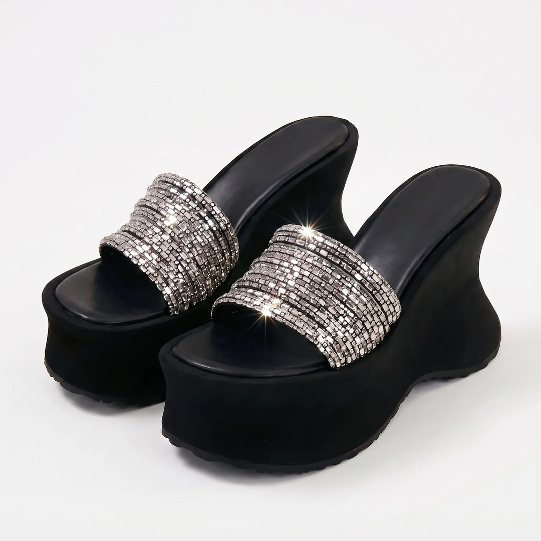 Fashionable women's chunky platform sandals, elevating summer footwear for both day and evening wear.