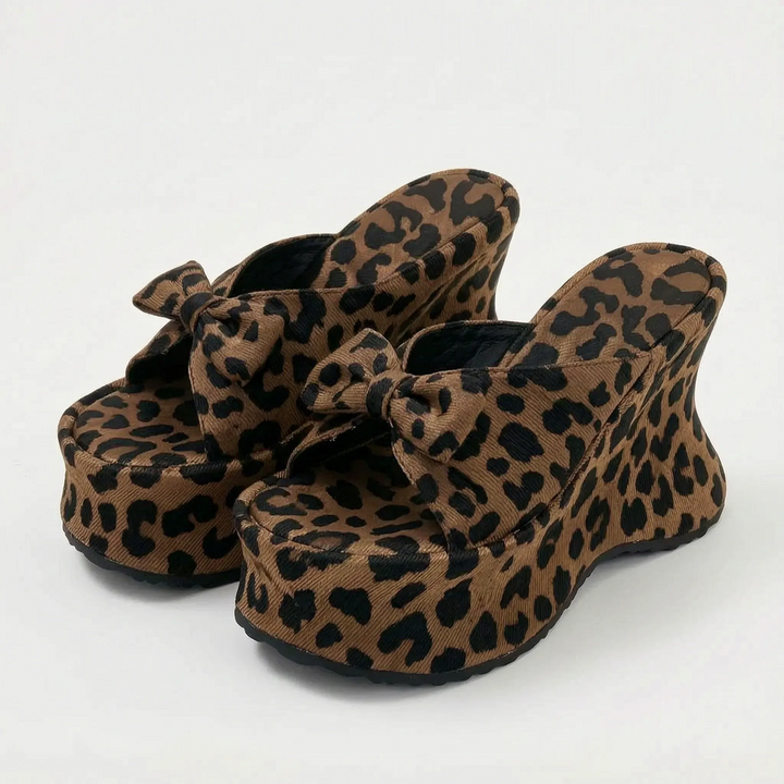 Chic animal print chunky platform sandals for women, offering elevated style & summer comfort.