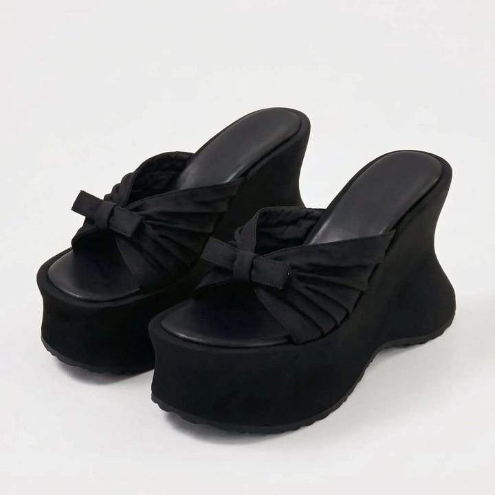 Women's slip-on wedge chunky platform sandals, a fashionable choice for elevated summer style.