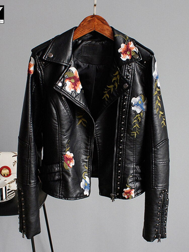Fitted women's cropped faux leather jacket with a chic zipper, making a bold statement for urban and casual wear.