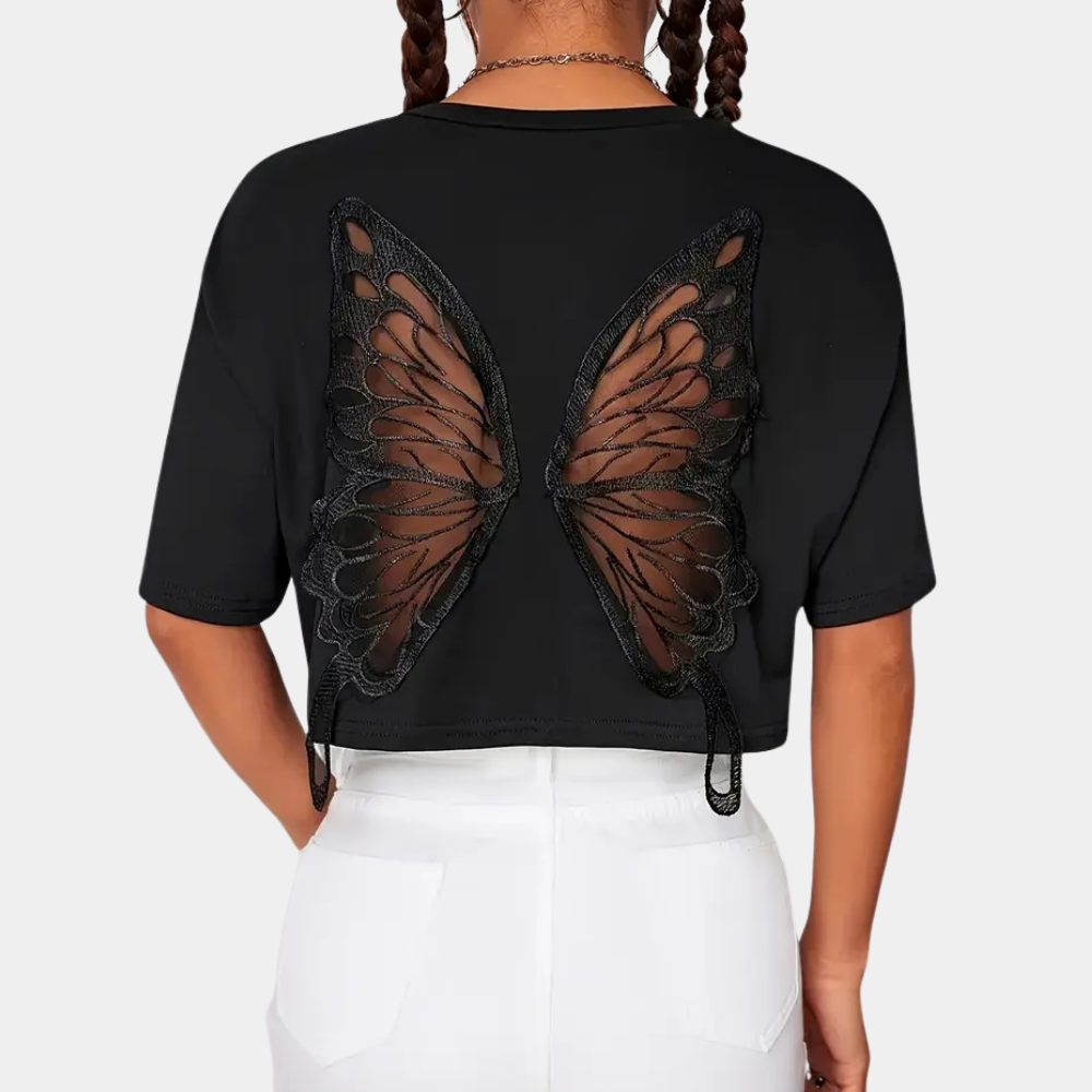 Comfortable black women's cropped top featuring a stylish butterfly print, ideal for everyday playful summer fashion.