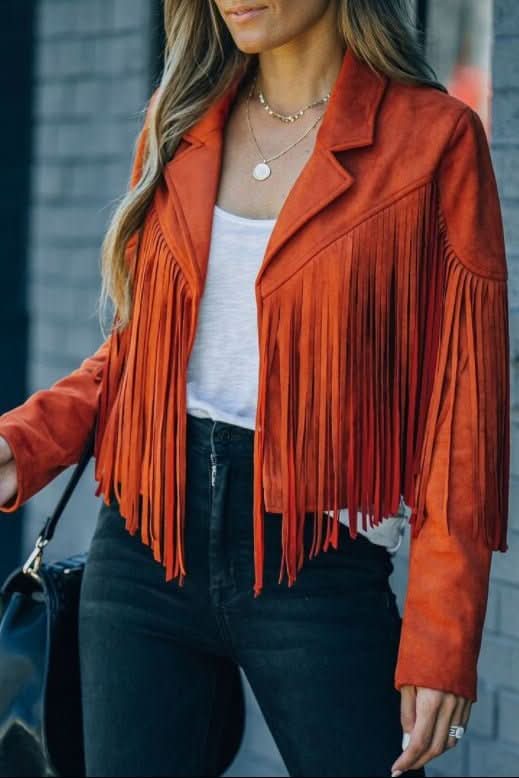 Women's black faux leather fringed moto jacket, perfect for an edgy statement style.