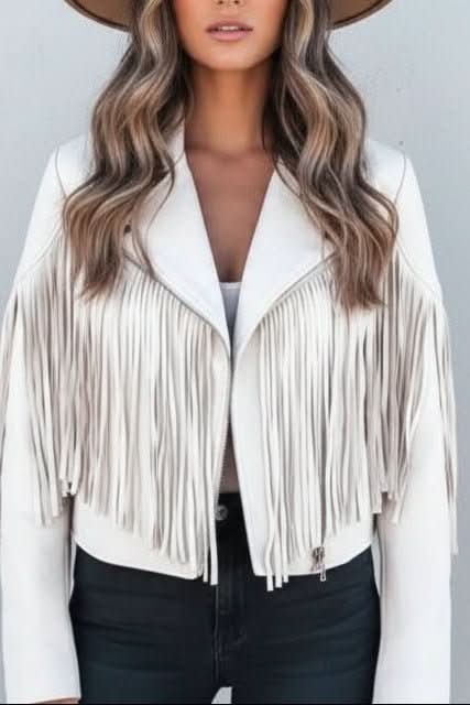 Fashionable women's edgy fringed jacket. A versatile biker jacket for casual or chic outfits.