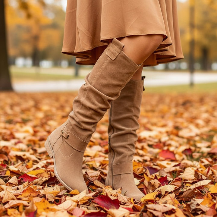 Women's black faux suede ankle boots with a comfortable block heel, perfect for fall fashion