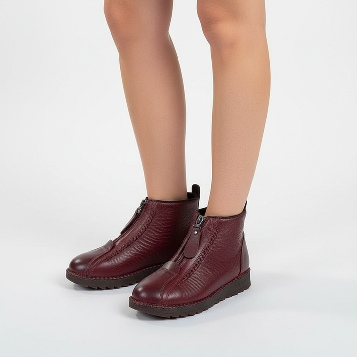 Stylish women's warm ankle boots, fleece-lined, ideal for cold weather, featuring a practical zip