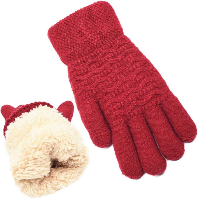 Close-up of the knitted texture on women's warm touchscreen gloves, showing conductive fingertips.
