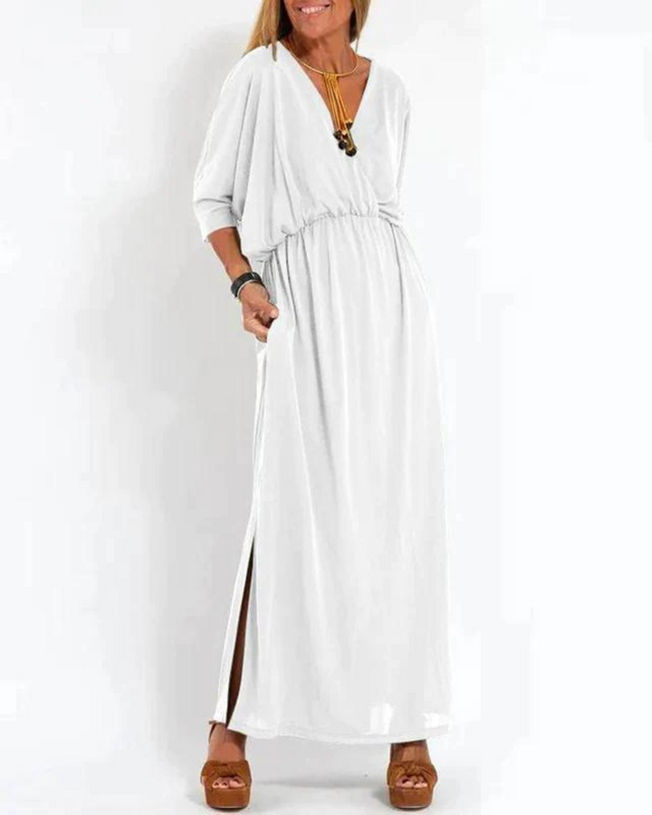 Green flowy midi dress with adjustable spaghetti straps. Elegant & comfortable for women's summer casual or evening.