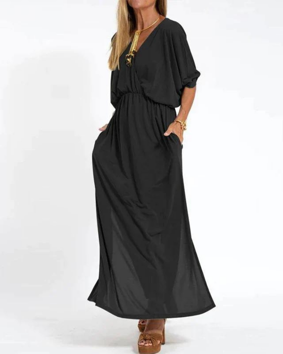 Stylish women's flowy midi dress with adjustable spaghetti straps, versatile for casual summer or elegant events.
