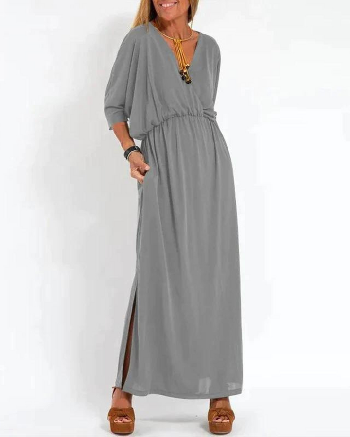 Casual green flowy midi dress for women with adjustable shoulder straps. Ideal for relaxed summer days & comfort.
