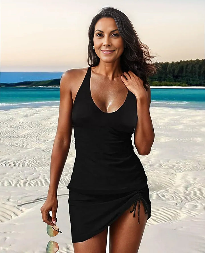 Stylish black two-piece tankini with ruffle detailing and halter neck for swimming