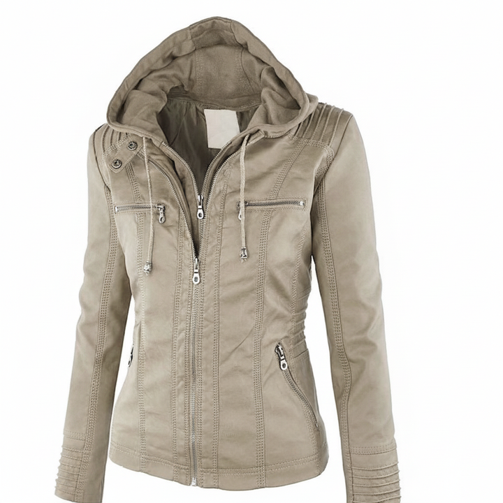 Women's leather jacket with hood draped on a hanger, presenting a timeless and versatile outerwear piece
