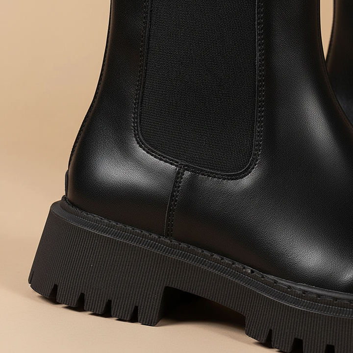 Stylish women's round toe Chelsea boots, ideal for everyday wear and providing winter comfort.