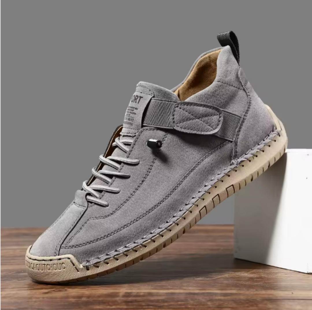 Close-up of mesh texture on women's lightweight slip-on walking sneakers for breathability & comfort.