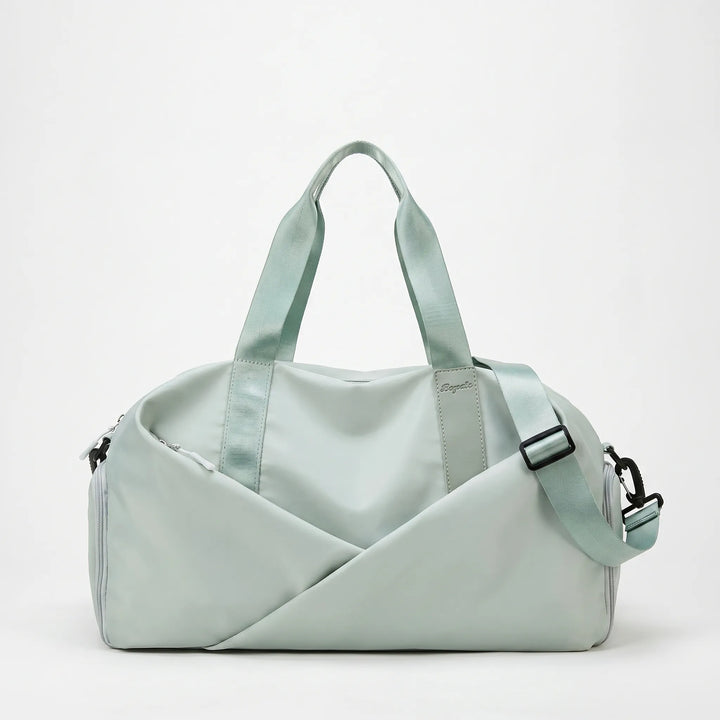 Versatile women's gym duffel bag in black, featuring multiple compartments including a ventilated shoe pocket.