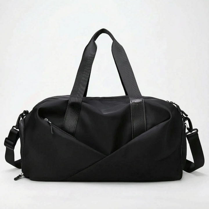 Sleek black nylon women's workout bag, a versatile duffel with a dedicated shoe compartment for active lifestyles.