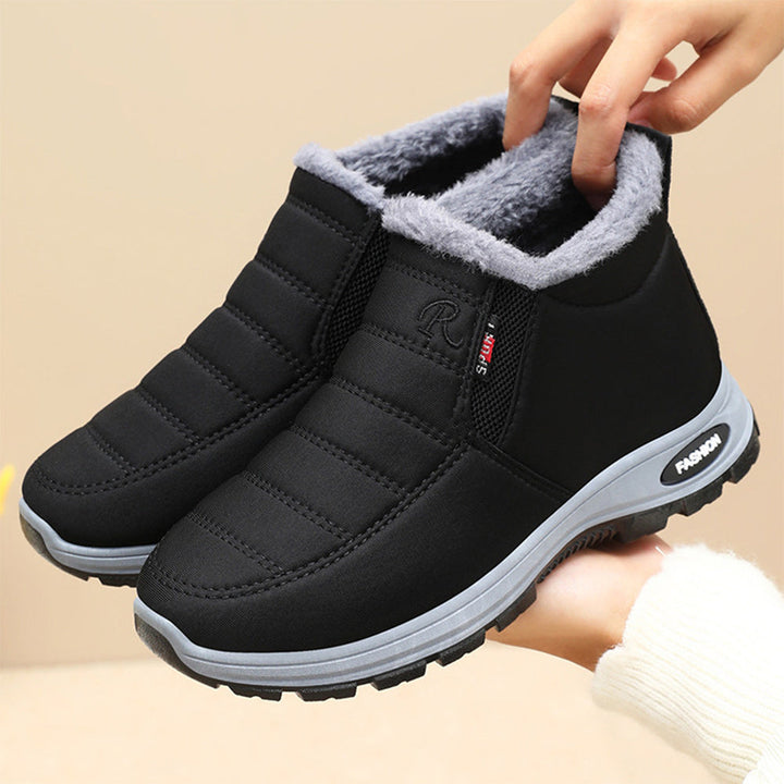 Stylish blue women's orthopedic ankle boots, offering ultimate warmth & comfort in winter.