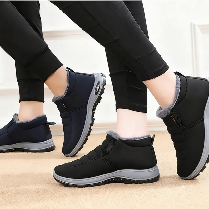 Red women's casual ankle boots with orthopedic support, ensuring comfort for winter.