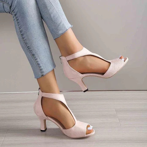 Women's black orthopedic high heels, offering stylish comfort & foot support. Perfect for elegant formal wear.