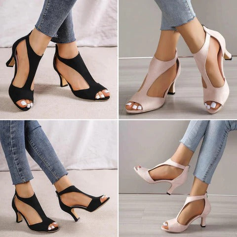 Stylish women's black orthopedic heels for comfort & foot support. Elegant formal footwear for fashion-conscious.