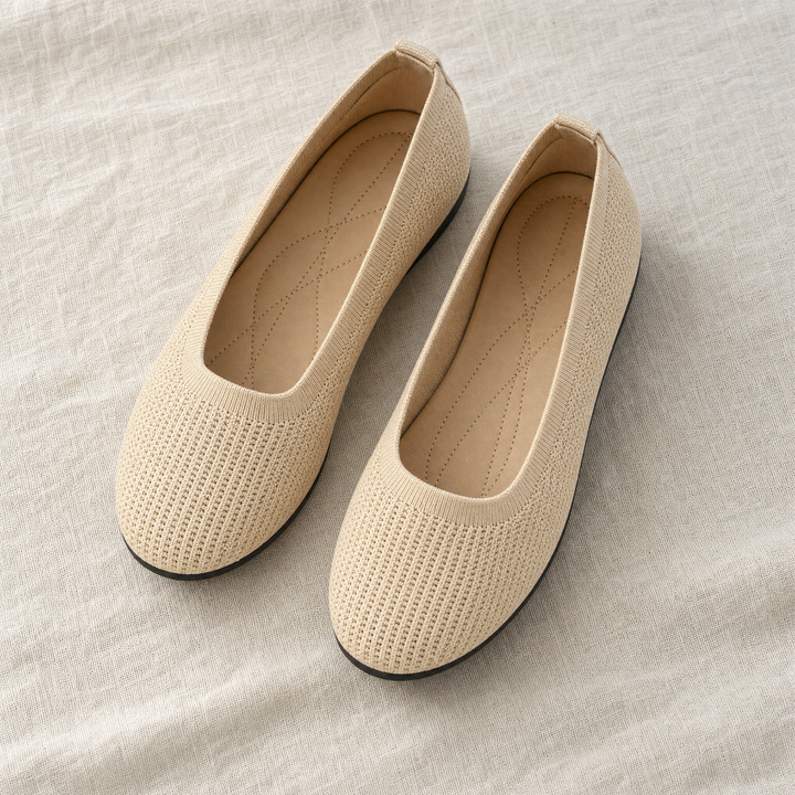 Top-down view of comfortable women's slip-on orthopedic footwear, perfect for casual posture support.
