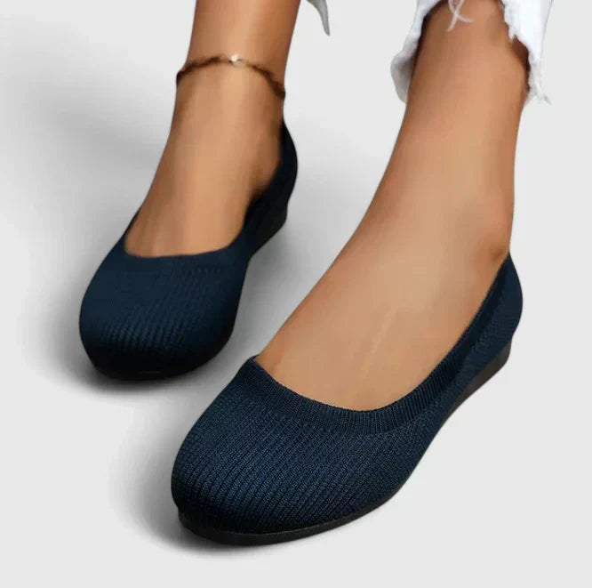 Close-up of textured upper on women's orthopedic slip-on shoes, designed for all-day comfort & foot support.