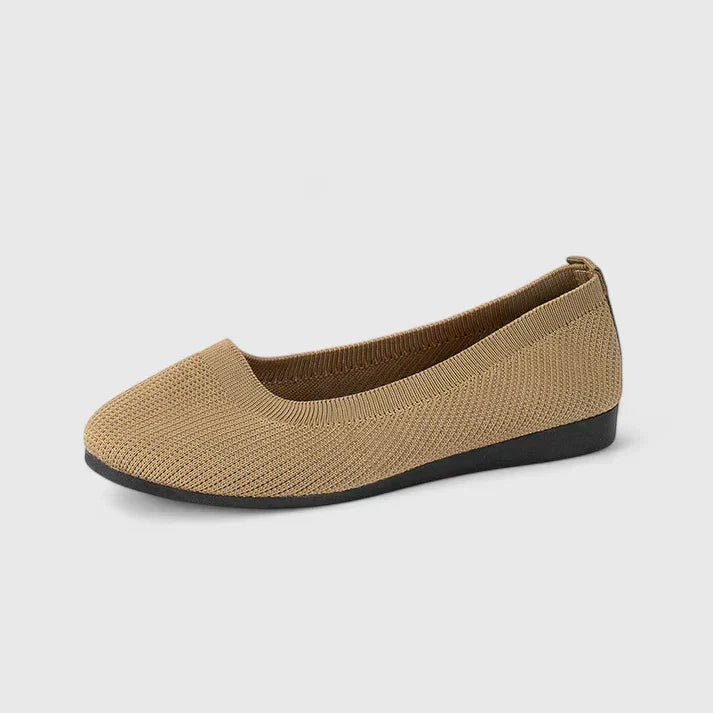 Rear view of women's orthopedic slip-on shoes, featuring cushioned heel for superior comfort & support.
