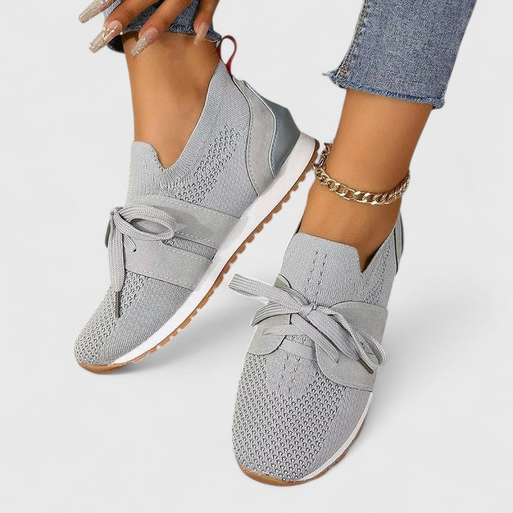 Lightweight women's slip-on walking sneakers, perfect for daily wear, offering orthopedic arch support and comfort.