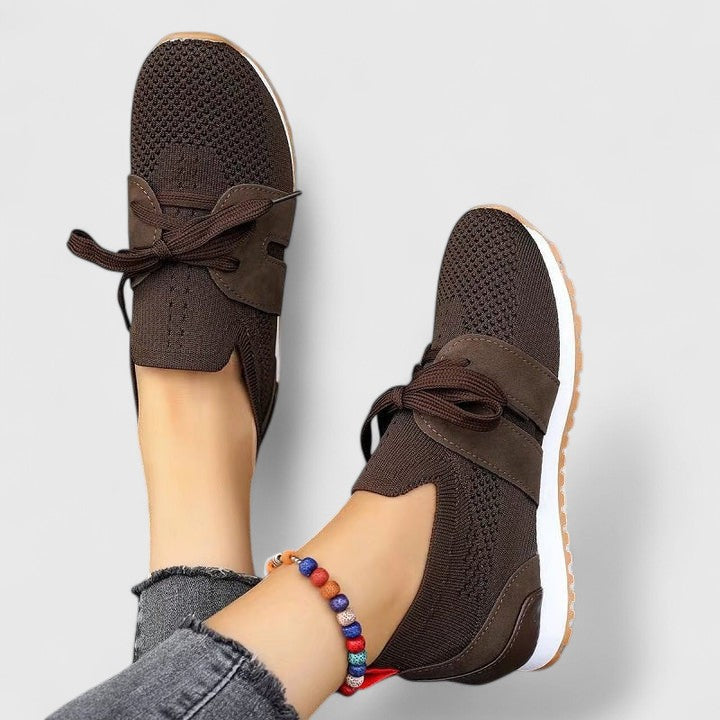 Stylish women's slip-on walking sneakers with orthopedic arch support, lightweight design for ultimate daily comfort.