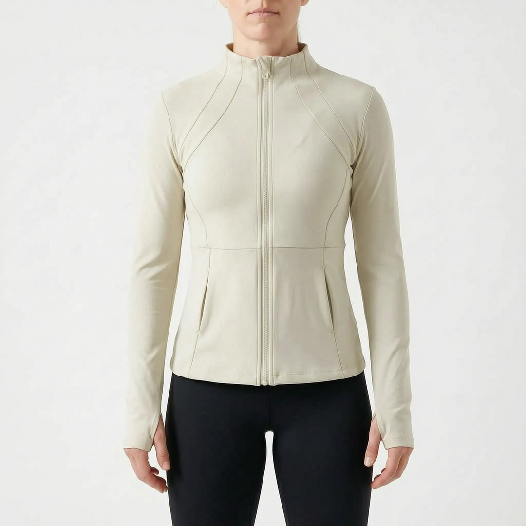 Women's workout jacket, a high-performance active layer with thumbholes for enhanced comfort.