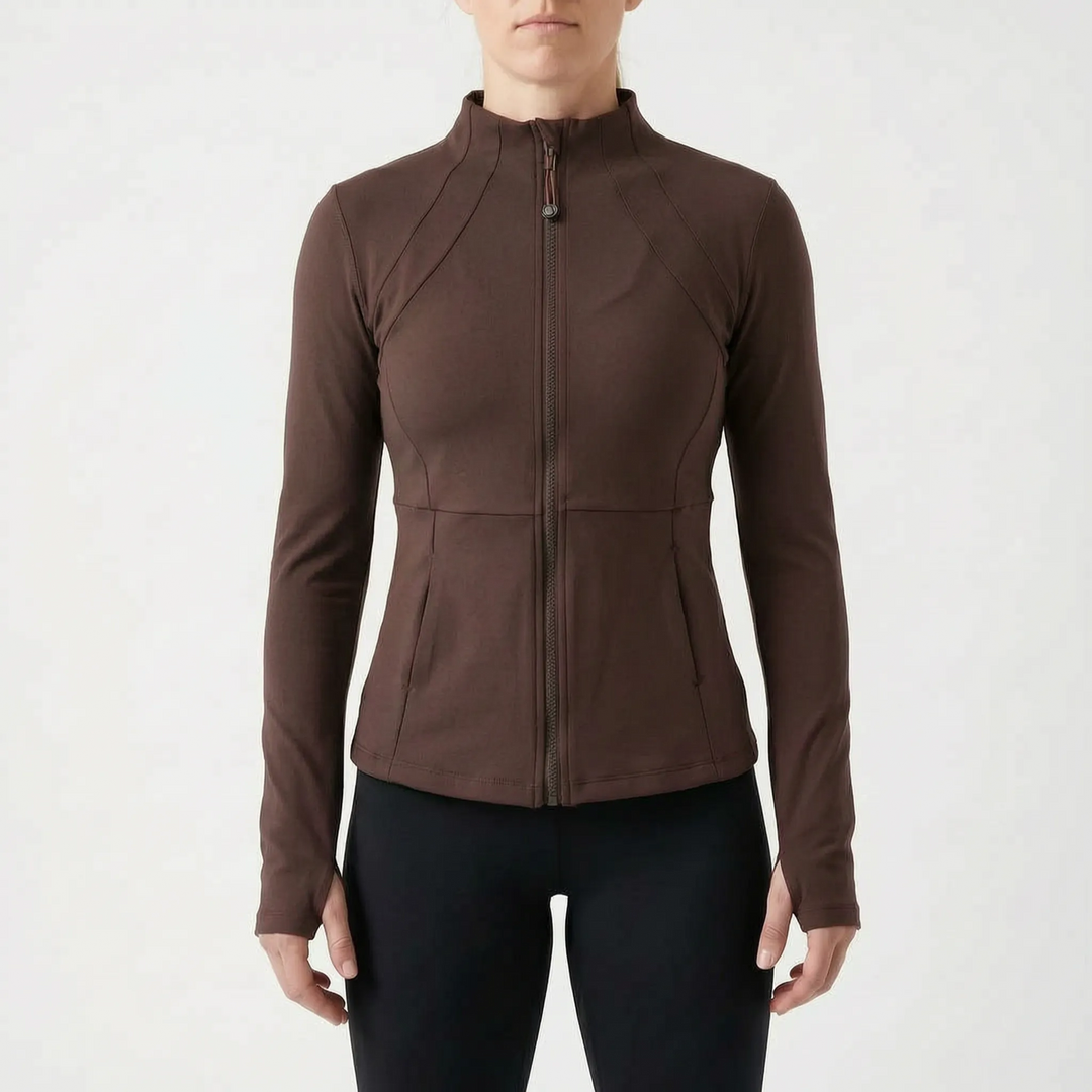 Versatile women's sports jacket with thumbholes, great for layering during various outdoor activities.