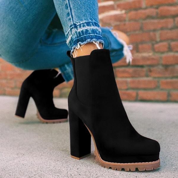 Chic women's platform ankle boots with a bold block heel, easy slip-on style, and durable construction.