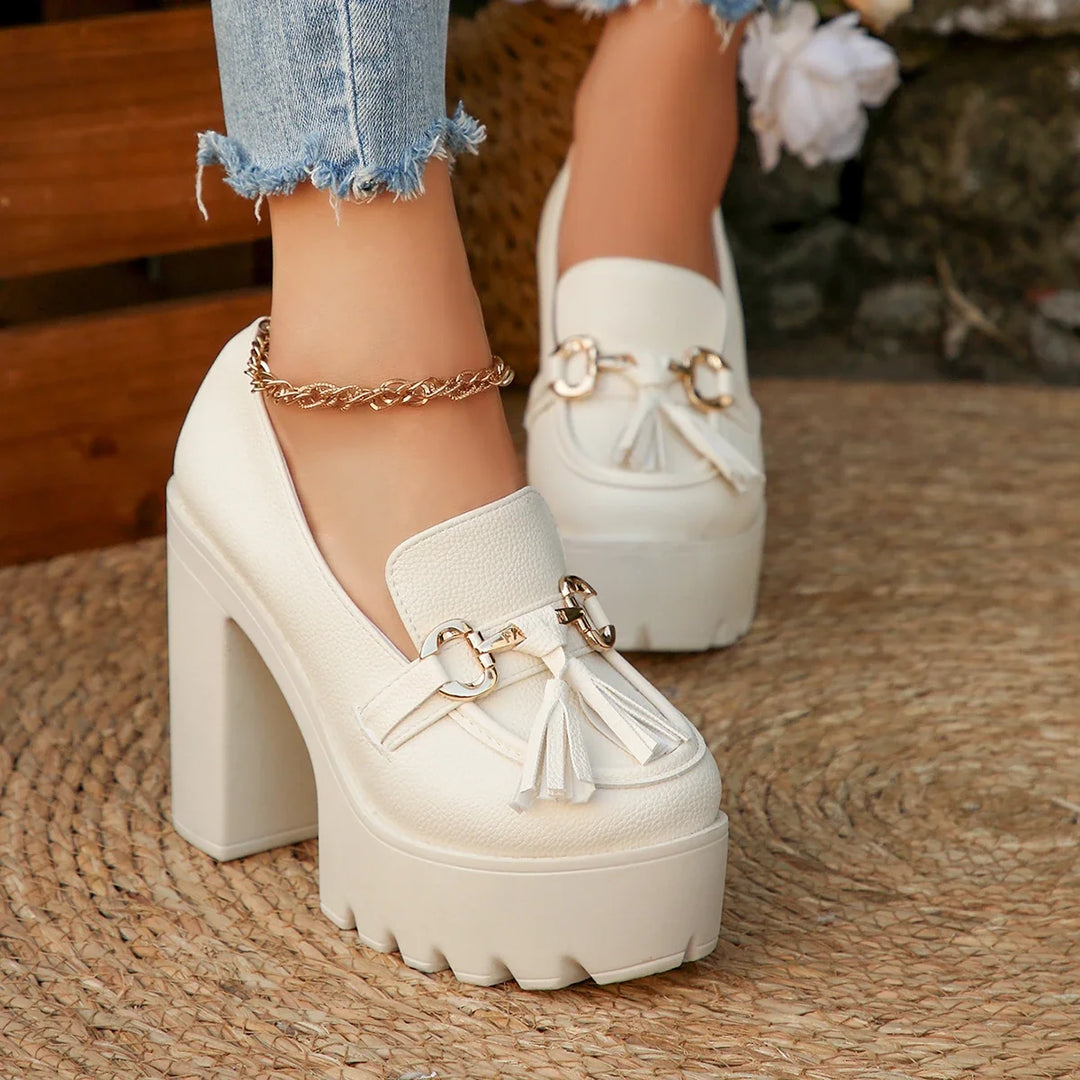 Chunky heel platform loafers for women, offering cushioned comfort. Sophisticated buckle for work & casual.