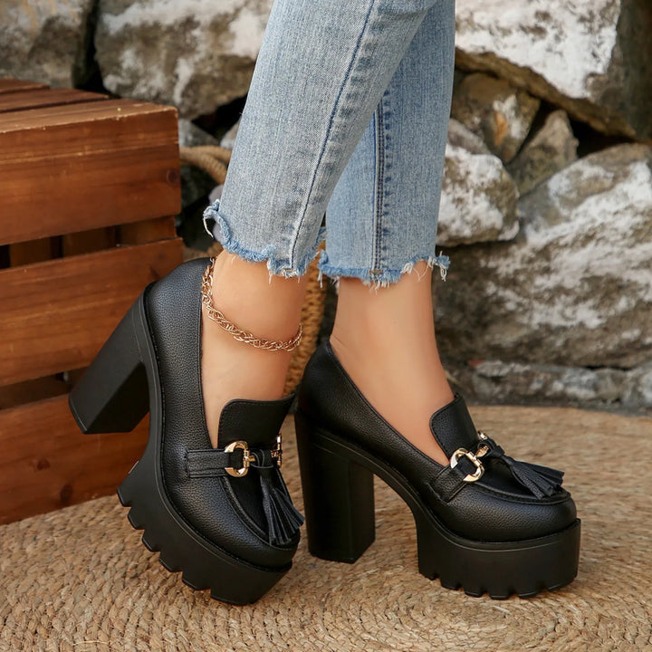 Stylish women's platform loafers with a modern buckle & comfortable chunky heel. Perfect for professional attire.